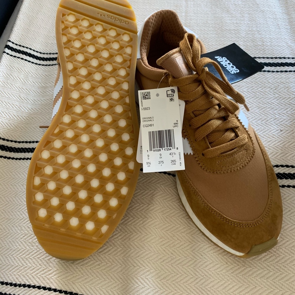 Men’s Adidas shoes 9 1/2. Never been worn